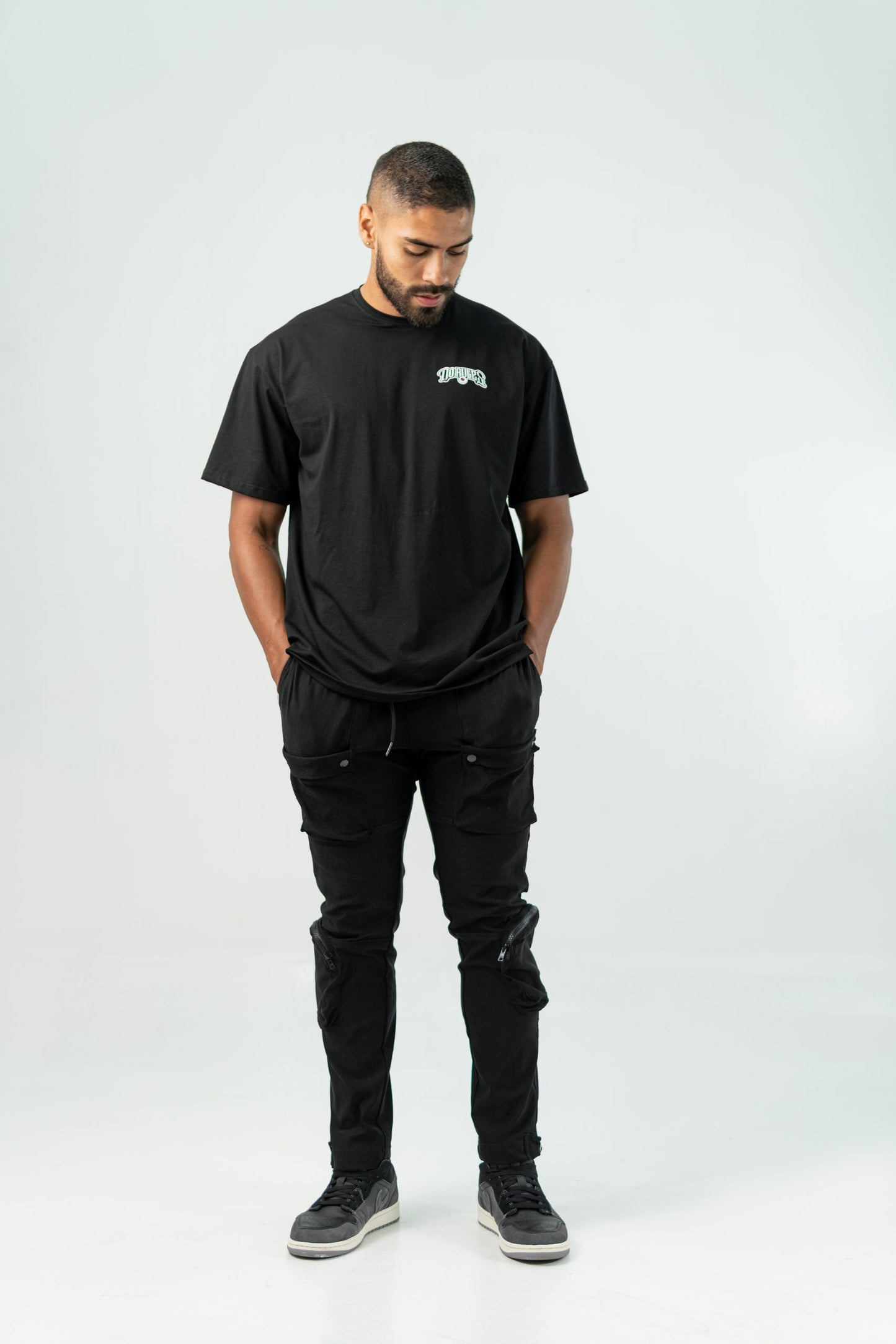 BLACK 'BE' LOOSE FIT UNISEX PRINTED T-SHIRT